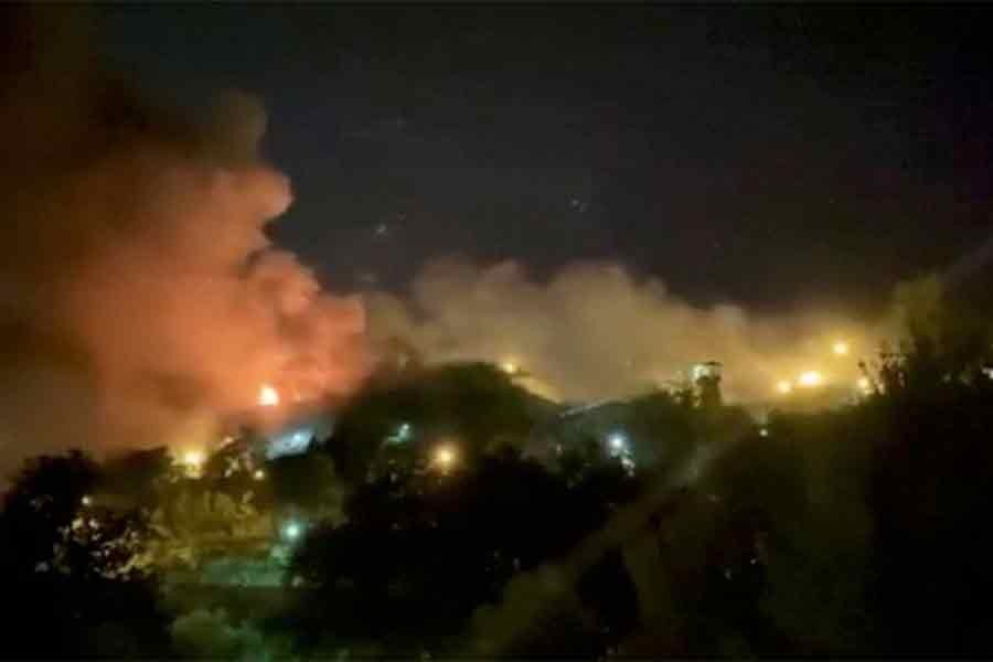 Smoke rising from Evin Prison in Tehran on Saturday in this still image taken from a video –Reuters