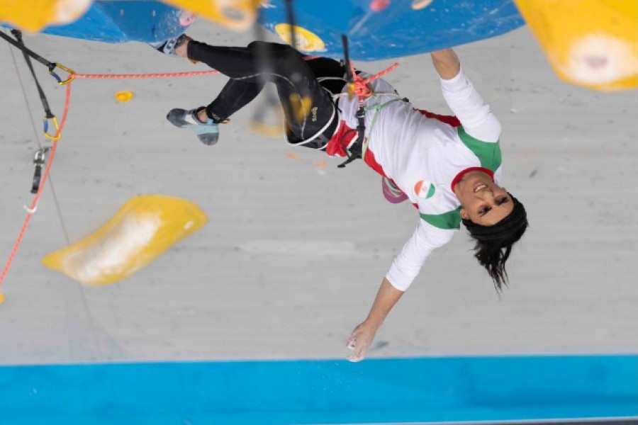 Iranian athlete Elnaz Rekabi competes during the women's Boulder & Lead final during the IFSC Climbing Asian Championships, in Seoul, Sunday, Oct. 16, 2022.