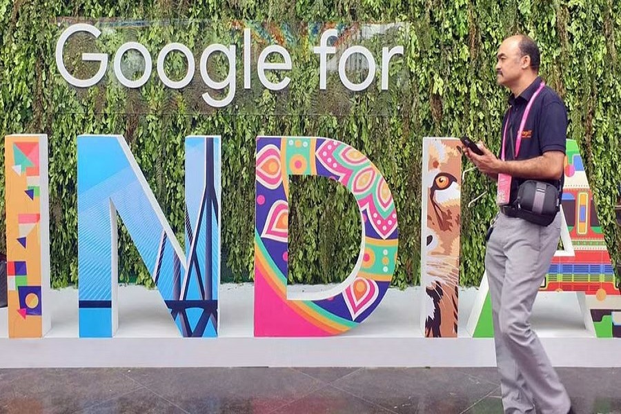 A man walks past the sign of "Google for India", the company's annual technology event in New Delhi, India, Sept 19, 2019.REUTERS