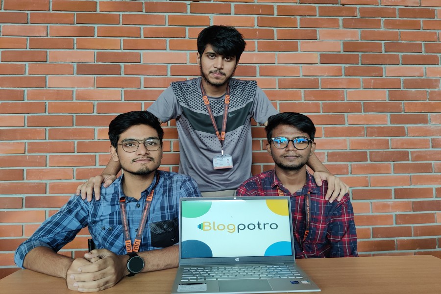 Ahsan Farabi (middle), founder of Blogpotro, with developers Maksaline (left) and Shanto.