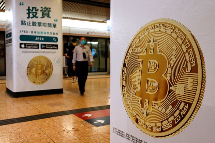 Advertisements for crypto exchange show a Bitcoin symbol at Mass Transit Railway (MTR) station, in Hong Kong, China on October 27, 2021 — Reuters/Files