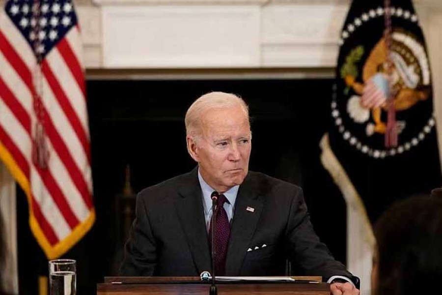 US President Joe Biden listens to a guest doctor speak during a meeting of the Reproductive Healthcare Access Task Force in the State Dining Room at the White House in Washington, US, October 4, 2022. REUTERS