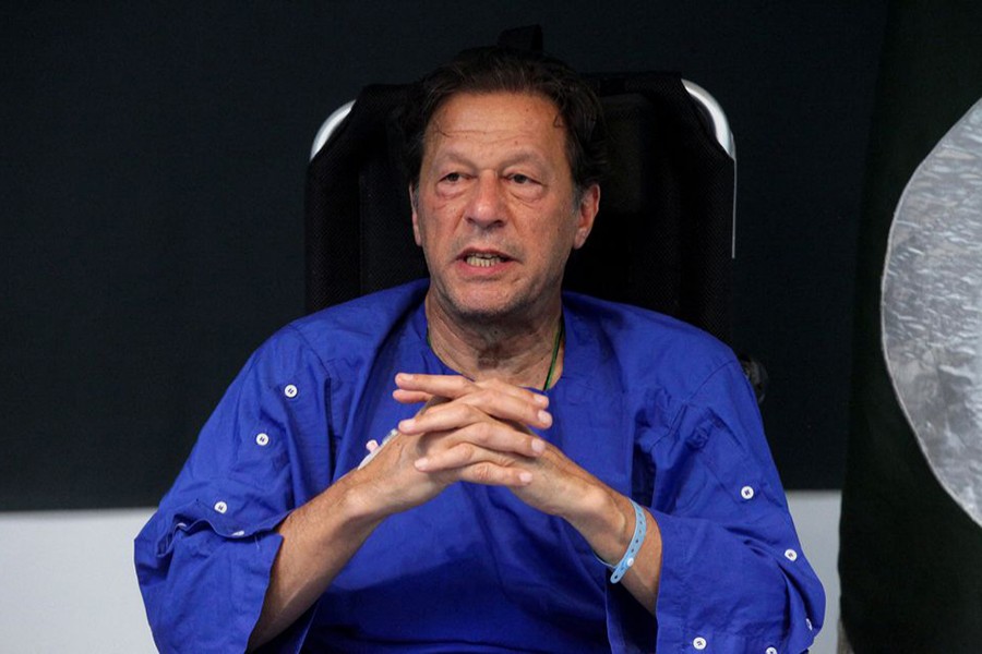 Former Pakistan's Prime Minister Imran Khan addresses a news conference after he was wounded following a shooting incident during a long march in Wazirabad, at the Shaukat Khanum Memorial Cancer Hospital & Research Centre in Lahore, Pakistan on November 4, 2022 — Reuters photo