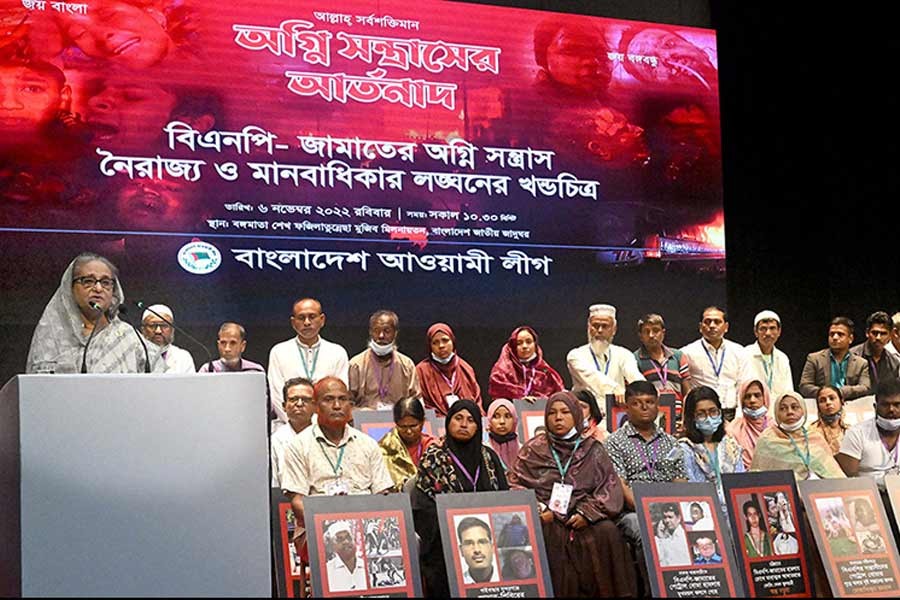 Prime Minister Sheikh Hasina addressing an exhibition and discussion on Sunday on the 2013-2015 nationwide violence when BNP and Jamaat waged a violent anti-government campaign enforcing a countrywide blockade –PID Photo