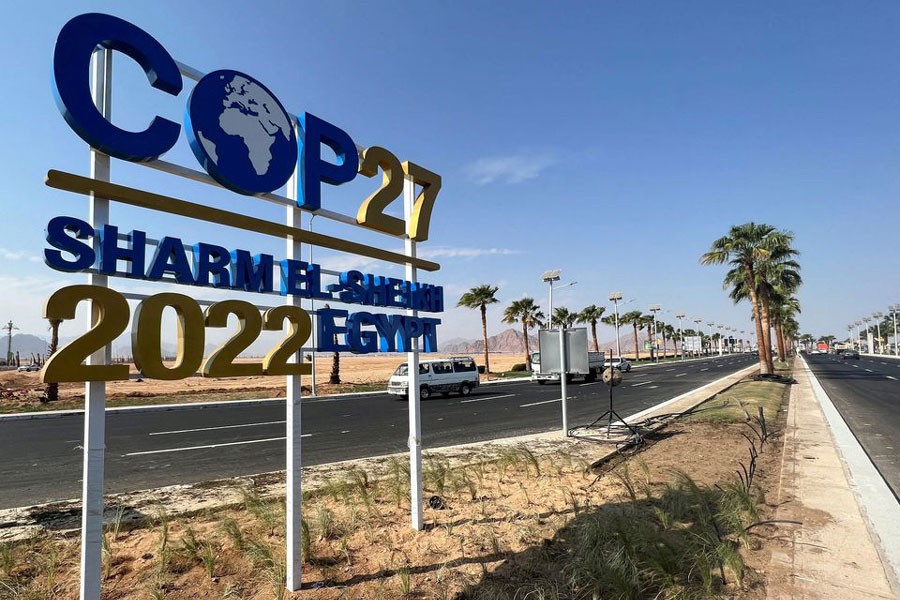 View of a COP27 sign on the road leading to the conference area in Egypt's Red Sea resort of Sharm el-Sheikh, Egypt.  The 2022 United Nations Climate Change Conference, more commonly referred to as Conference of the Parties of the UNFCCC, or COP27, started on Sunday. 	—Reuters Photo