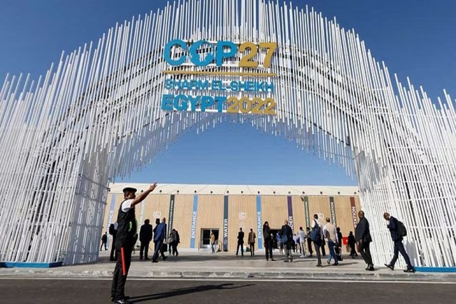 A police officer stands in front of the entrance of the Sharm El Sheikh International Convention Centre during the COP27 climate summit in Egypt's Red Sea resort of Sharm el-Sheikh, Egypt November 9, 2022. REUTERS/Emilie Madi