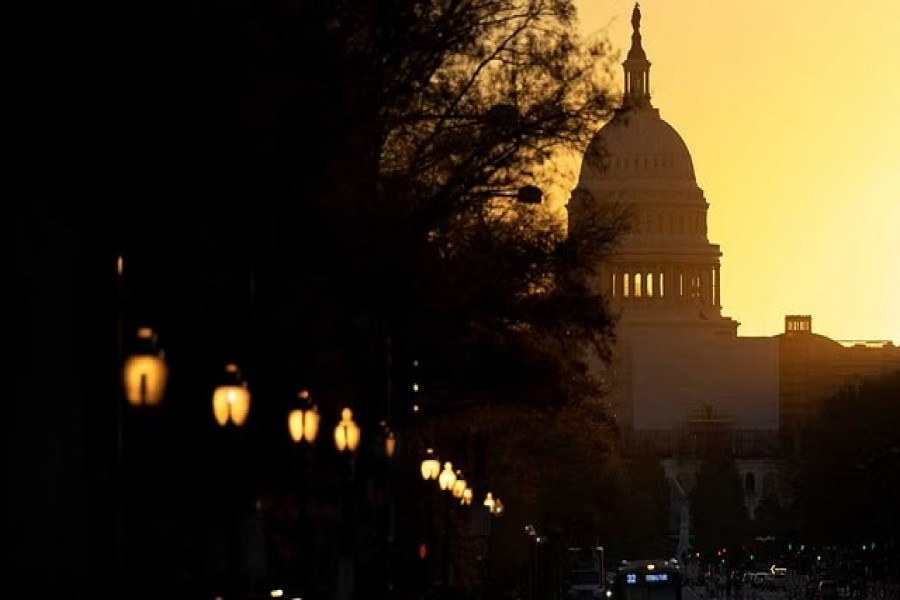 The sun rises over the US Capitol, as control of Congress remained unclear following the 2022 US midterm elections in Washington, US, November 9, 2022.REUTERS/Tom Brenner