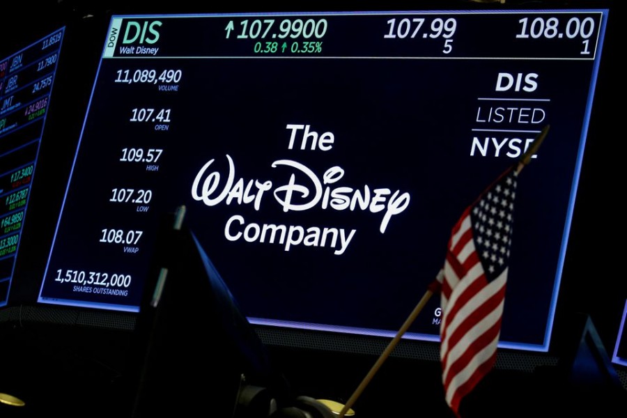 A screen shows the logo and a ticker symbol for The Walt Disney Company on the floor of the New York Stock Exchange (NYSE) in New York, US on December 14, 2017 — Reuters/Files