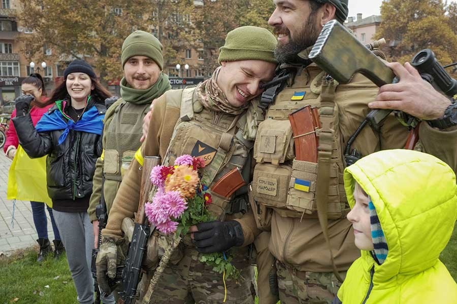 Local residents welcoming Ukrainian servicemen as people celebrate after Russia's retreat from Kherson of Ukraine on Saturday –Reuters photo