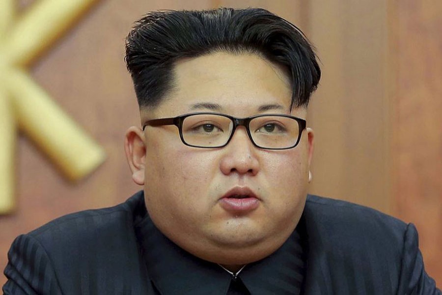 N Korea's Kim oversees ICBM test, vows more nuclear weapons