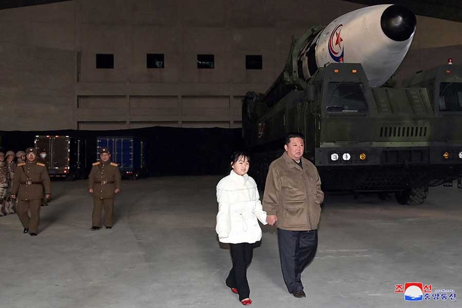 North Korea's Kim reveals daughter at ballistic missile test