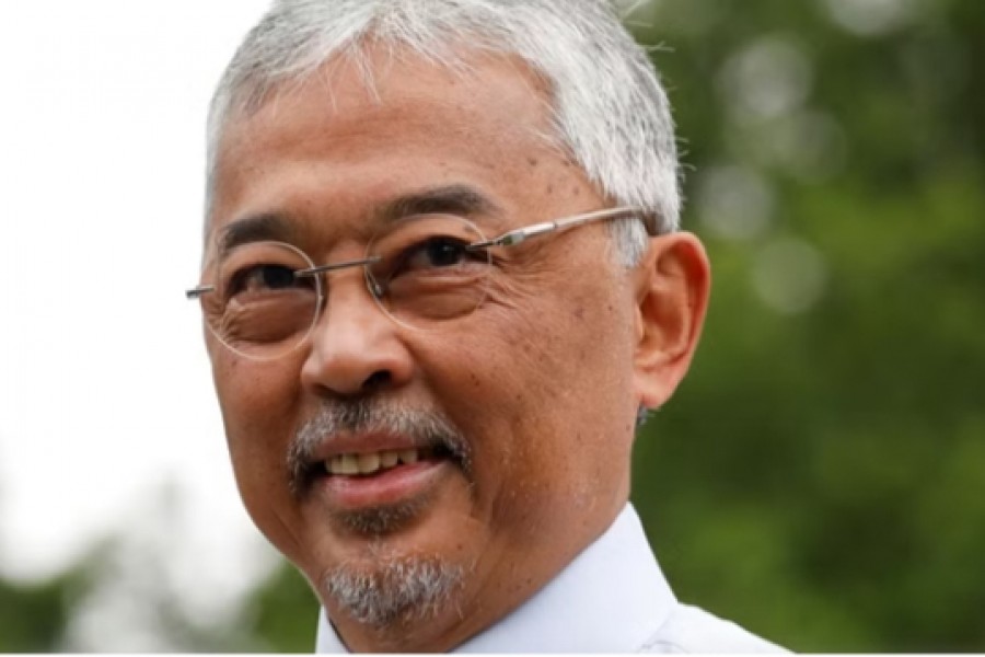 Malaysian King Sultan Abdullah Sultan Ahmad Shah smiles outside the National Palace in Kuala Lumpur, Malaysia Nov 21, 2022. REUTERS/Hasnoor Hussain