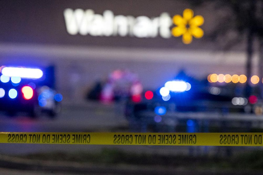 Police tape cordons off the scene of a fatal shooting at a Chesapeake, Va., Walmart Tuesday on November 22, 2022 — AP photo