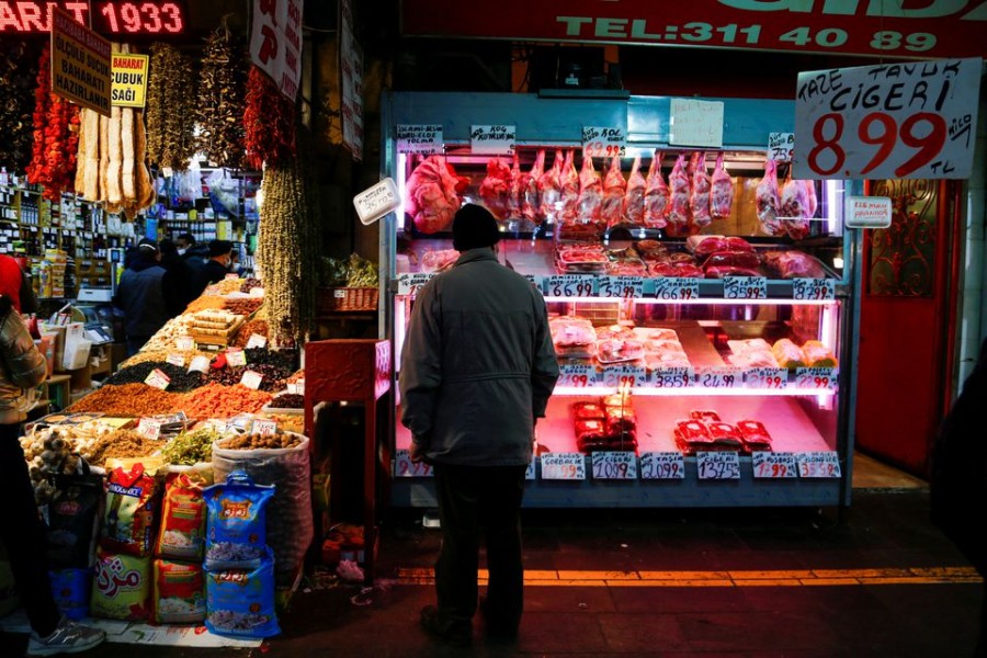 A man looks at a butcher shop window in Ankara, Turkey on February 16, 2022 — Reuters/Files