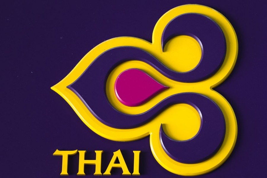 The logo of Thai Airways is pictured at its office building in central Bangkok, Thailand, January 5, 2016. REUTERS/Athit Perawongmetha