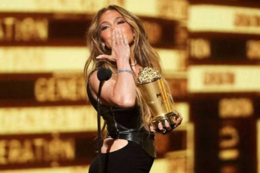 Jennifer Lopez reacts after winning the MTV Generation Award at the MTV Movie & TV Awards at Barker Hangar in Santa Monica, California, US, June 5, 2022. REUTERS/Mario Anzuoni/File Photo