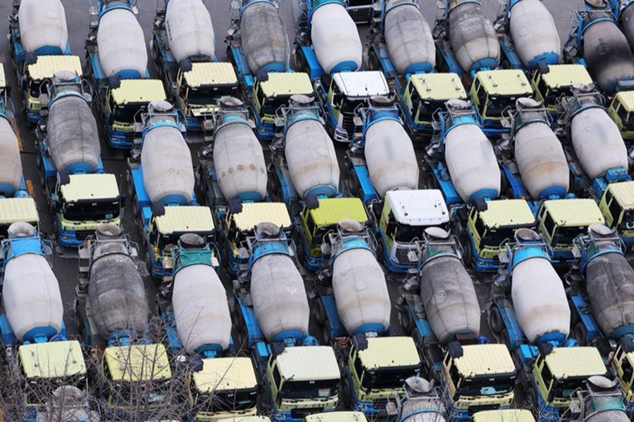 Concrete mixer trucks are parked at a factory due to a strike by a truckers' union in Anyang, South Korea on November 28, 2022 — Yonhap via REUTERS