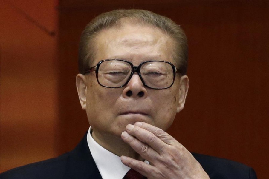 Former Chinese President Jiang Zemin watches the proceedings at the opening session of the 18th Communist Party Congress held at the Great Hall of the People in Beijing, Nov. 8, 2012. Jiang has died Wednesday, Nov. 30, 2022, at age 96. (AP Photo/Ng Han Guan, File)