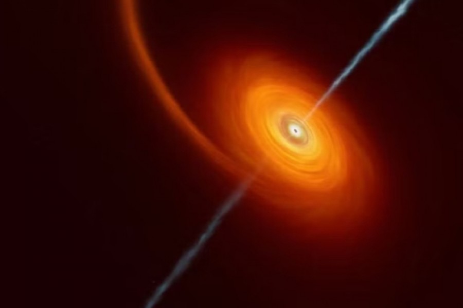 This undated artist’s impression illustrates how it might look when a star approaches too close to a black hole, where the star is squeezed by the intense gravitational pull of the black hole. Some of the star’s material gets pulled in and swirls around the black hole forming the disc that can be seen in this image. In rare cases, such as this one, jets of matter and radiation are shot out from the poles of the black hole. ESO/M.Kornmesser/Handout via REUTERS