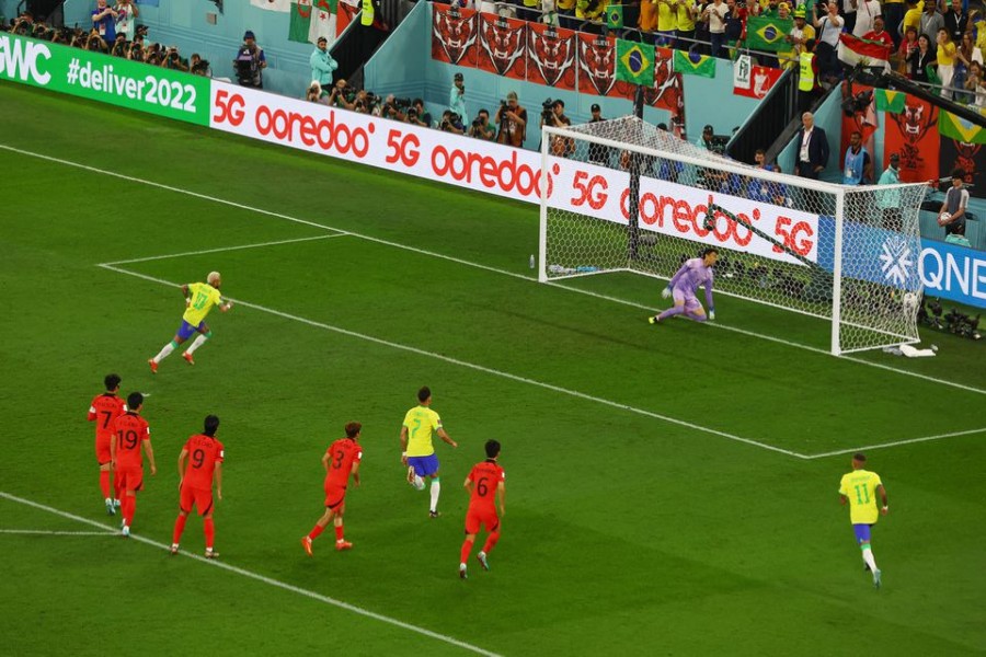 Soccer Football - FIFA World Cup Qatar 2022 - Round of 16 - Brazil v South Korea - Stadium 974, Doha, Qatar - December 5, 2022 Brazil's Neymar scores their second goal from the penalty spot REUTERS/Paul Childs