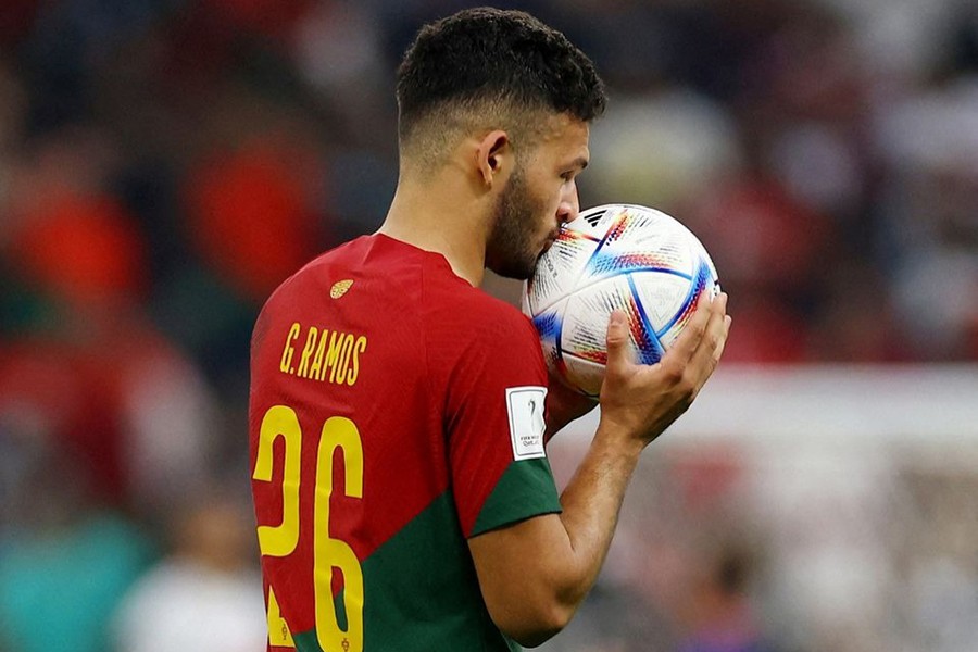 Portugal's Goncalo Ramos kisses the ball after the match Switzerland after scoring a hat-trick at Lusail Stadium, Lusail, Qatar on December 6, 2022 — Retuers photo