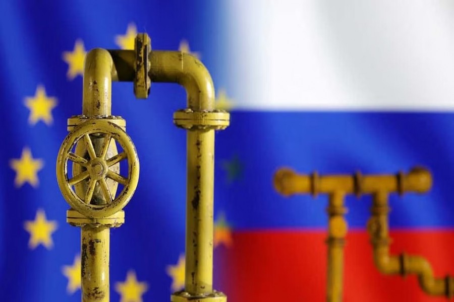Model of natural gas pipeline, EU and Russia flags, Jul 18, 2022. REUTERS