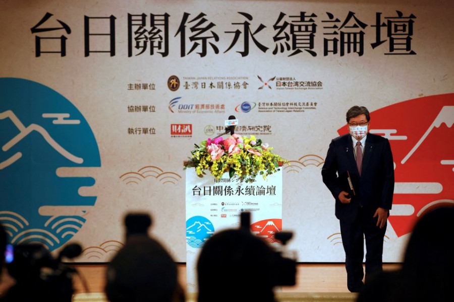 Koichi Hagiuda, policy chief for Japan's ruling Liberal Democratic Party arrives on stage to speak at a forum in Taipei, Taiwan, December 11, 2022. REUTERS/Ann Wang