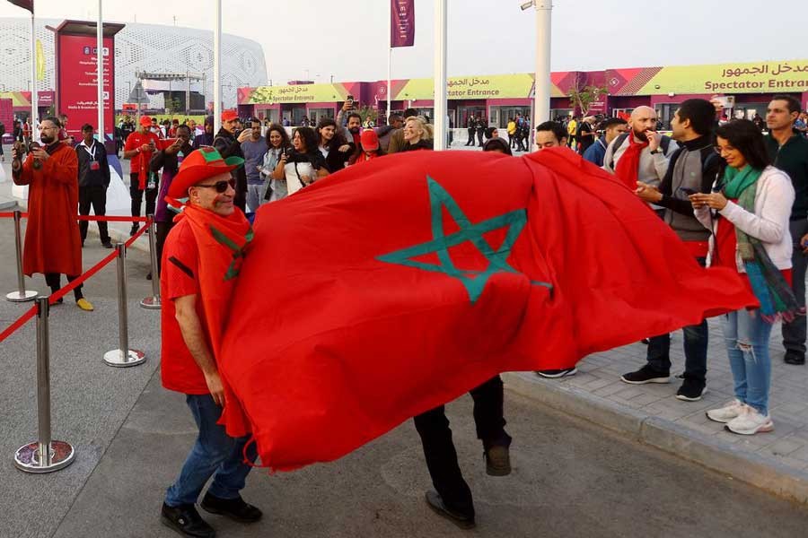 Morocco fans are pictured with the flag of Morocco outside the Al Thumama Stadium in Doha before - FIFA World Cup Qatar 2022 quarter-final match against Portugal on December 10 this year –Reuters file photo