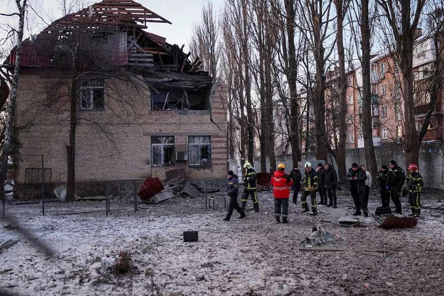 Rescuers and police officers examining parts of the drone at the site of a building destroyed by a Russian drone attack in Kyiv on Wednesday –Reuters photo