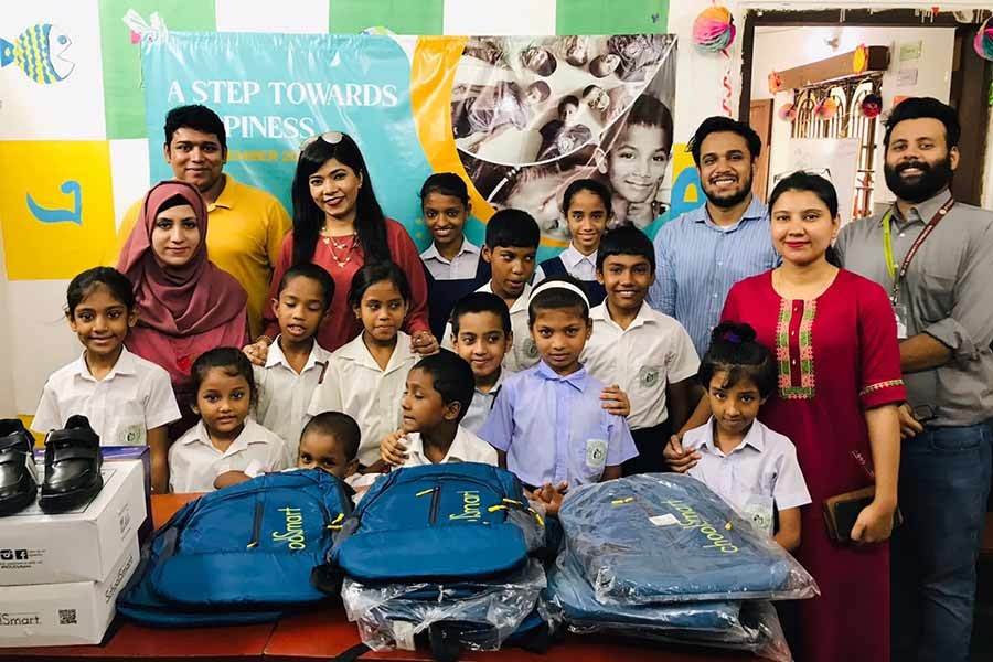 Apex partners with IHF School to provide school shoes, bags to underprivileged children