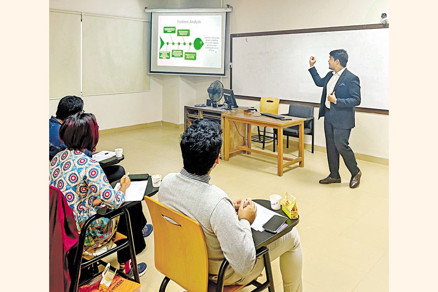 A participant presenting his findings in the semi-final of the Hult Prize contest held at North South University recently