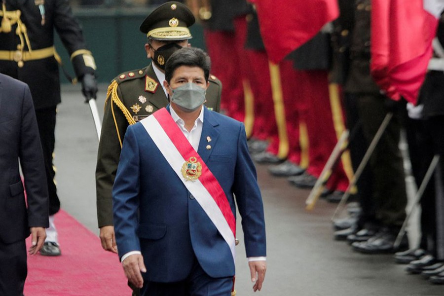 Peru's President Pedro Castillo walks, ahead of delivering his Independence Day address to the nation, outside the Legislative Palace in Lima, Peru on July 28, 2022 — Reuters/Files