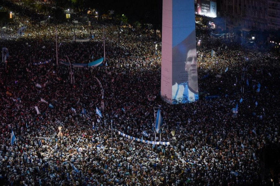 Argentina fans celebrate winning the World Cup at the Obelisk with an image of Lionel Messi in Buenos Aires, Argentina on December 18, 2022 — Reuters photo