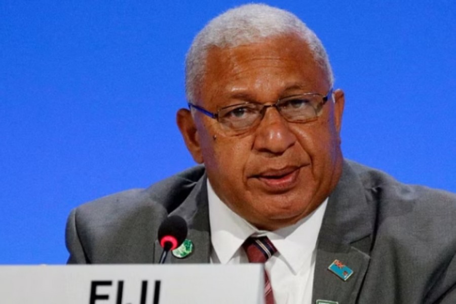 Fiji Prime Minister Josaia Voreqe 'Frank' Bainimarama attends a meeting during the UN Climate Change Conference (COP26) in Glasgow, Scotland, Britain, Nov 2, 2021.REUTERS