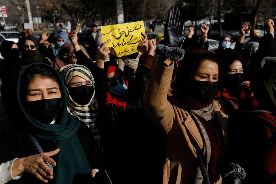 Afghan women chanting slogans in Kabul on Thursday in protest against the closure of universities to women by the Taliban –Reuters photo