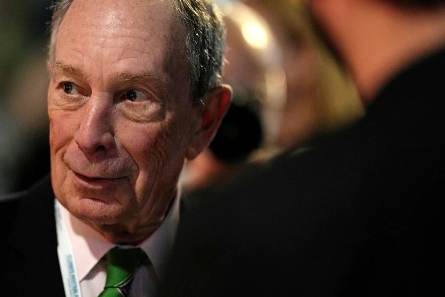 Former mayor of New York Michael Bloomberg speaks with participants prior to a meeting with Earthshot prize winners and finalists at the Glasgow Science Center during the UN Climate Change Conference (COP26) in Glasgow, Scotland, Britain on November 2, 2021 — Pool via Reuters