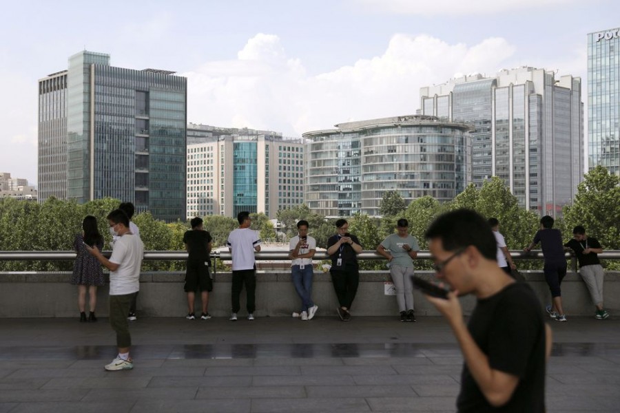 People are seen at Beijing's tech hub Zhongguancun, China on August 23, 2021  — Reuters/Files