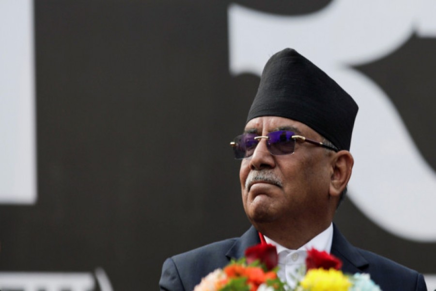 Former Prime Ministers Pushpa Kamal Dahal, also known as Prachanda, who is opposing the current Prime Minister Khadga Prasad Sharma Oli, also known as K.P. Oli, take part in a mass gathering against the dissolution of parliament, in Kathmandu, Nepal February 10, 2021. REUTERS/Navesh Chitrakar