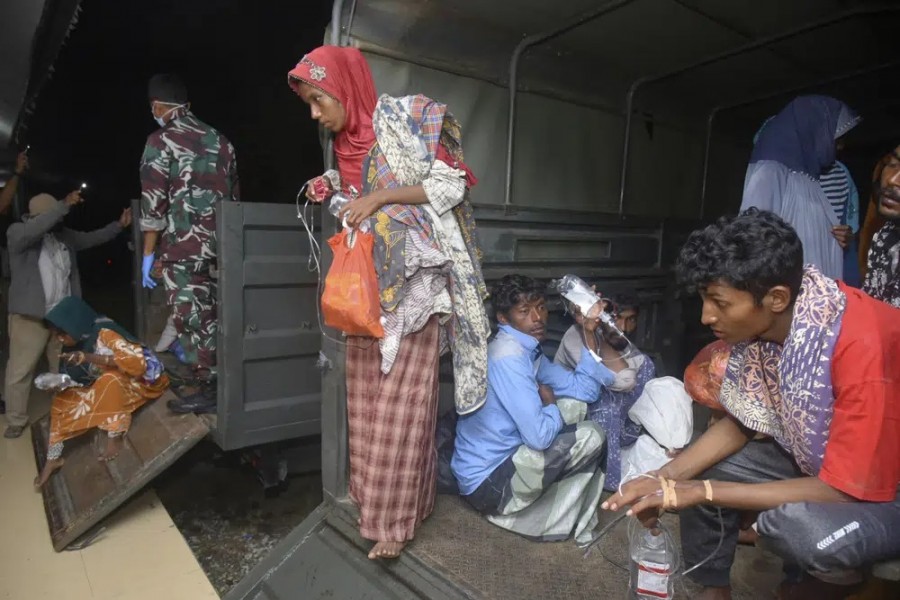 More Rohingya refugees reach Indonesia after weeks at sea