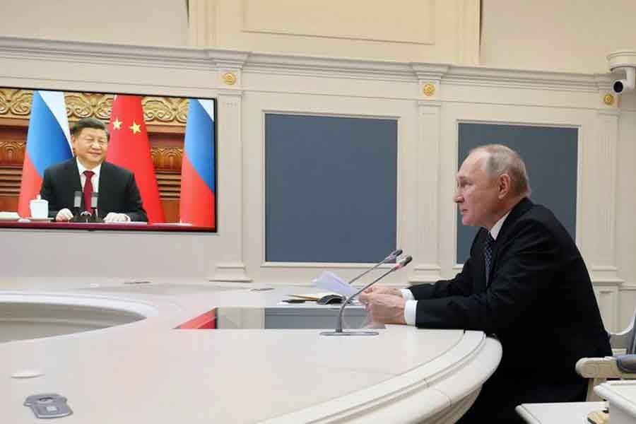 Russia's President Vladimir Putin holding talks with China's President Xi Jinping via a video link from Moscow on Friday –Reuters photo