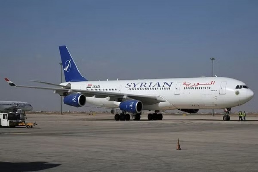 A SyrianAir Airbus A340-300 is pictured at Damascus International Airport, on its re-opening day for regular international commercial traffic after months of closure following the coronavirus disease (COVID-19) outbreak, in this handout released by SANA on Oct 1, 2020, Syria. SANA/Handout via REUTERS