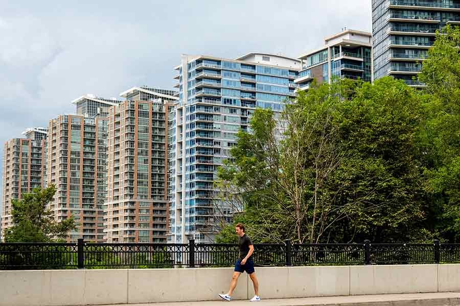 A pedestrian walking past condo buildings in the Liberty Village neighbourhood in Toronto of Canada on July 13 last year –Reuters file photo