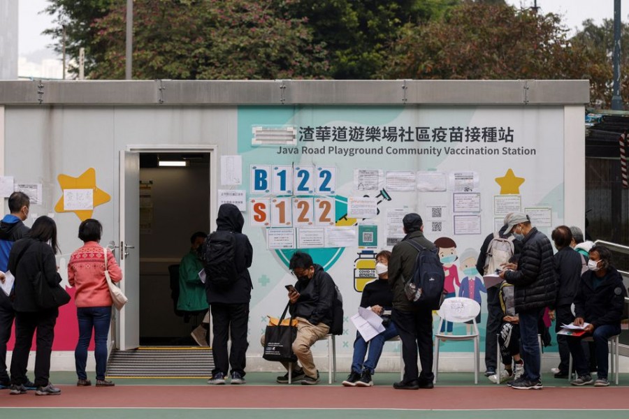 People queue at a community vaccination centre, ahead of an expected border reopening with China, during the coronavirus disease (Covid-19) pandemic in Hong Kong, China on January 4, 2023 — Reuters photo