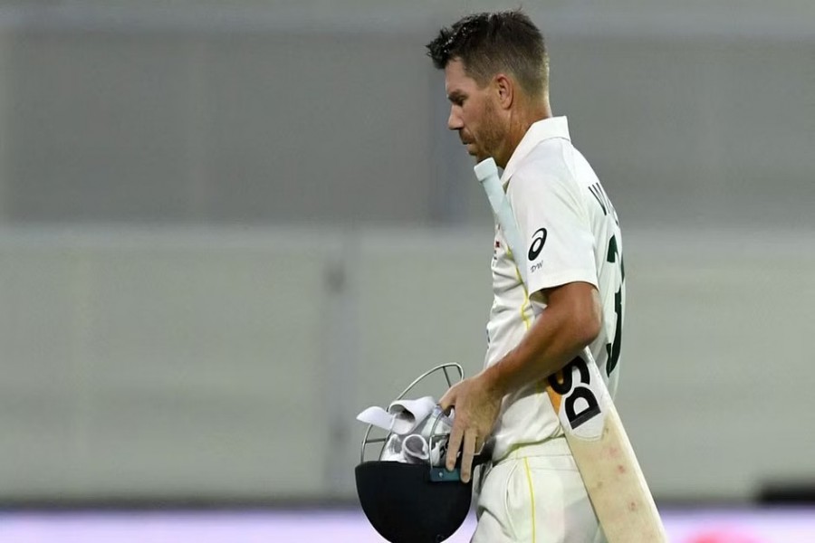 Cricket - Ashes - Second Test - Australia v England - Adelaide Oval, Adelaide, Australia - Dec 16, 2021, Australia's David Warner walks off after losing his wicket. REUTERS