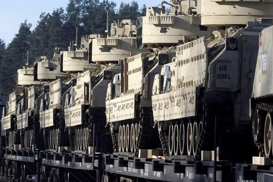 US Bradley Fighting Vehicles that will be deployed in Latvia for NATO's Operation Atlantic Resolve wait for an unload in Garkalne, Latvia Feb 8, 2017. REUTERS