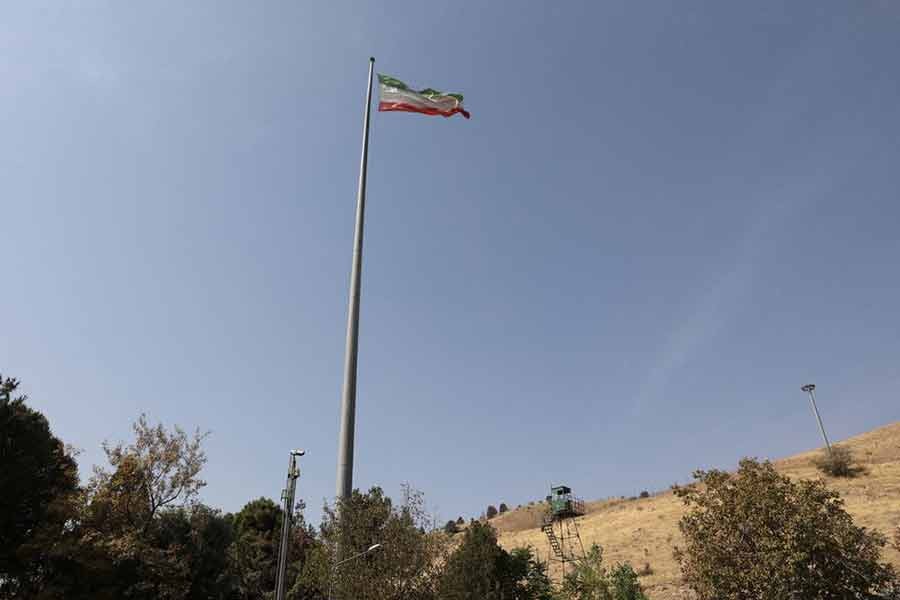 The Iranian flag is seen flying over Evin prison in Tehran -Reuters file photo