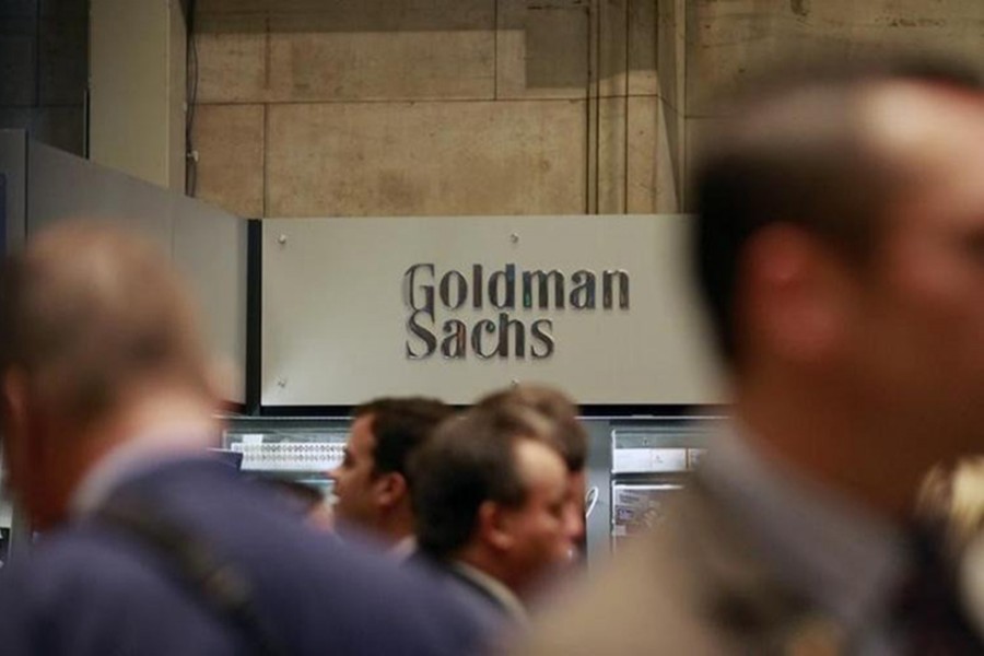 Traders work on the floor of the New York Stock Exchange near the Goldman Sachs stall on July 16, 2010 — Reuters/Files