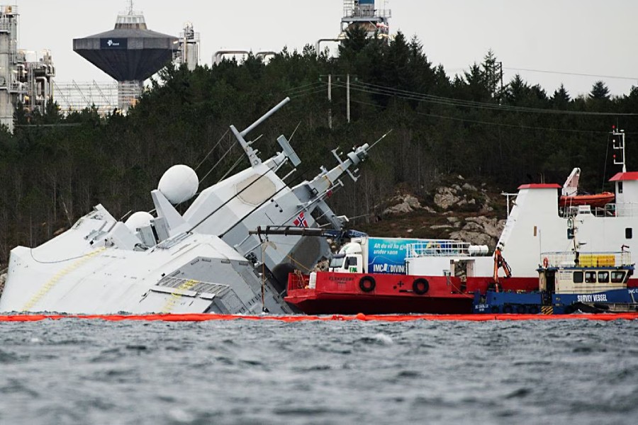 The Norwegian frigate "KNM Helge Ingstad" takes on water after a collision with the tanker "Sola TS" in Oygarden, Norway, November 10, 2018. NTB Scanpix/Marit Hommedal via REUTERS/File Photo
