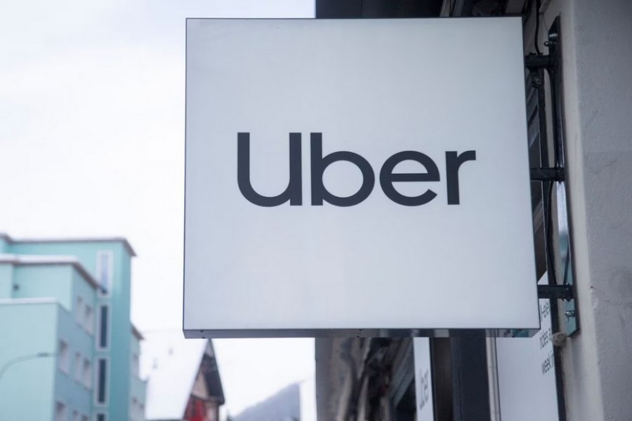 The logo of Uber is seen at a temporary showroom at the Promenade road during the World Economic Forum (WEF) 2023, in the Alpine resort of Davos, Switzerland, January 20, 2023. REUTERS/Arnd Wiegmann