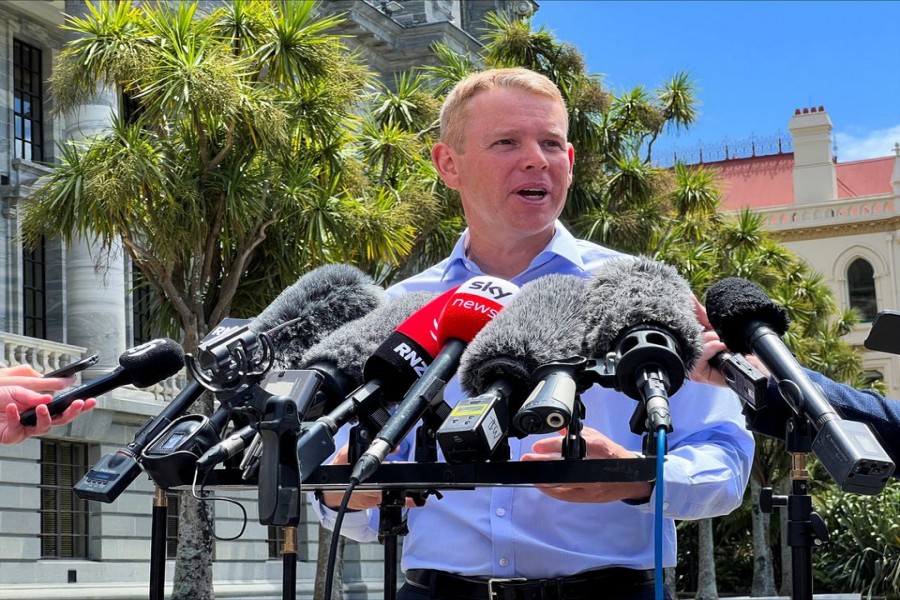 Chris Hipkins speaks to members of the media, after being confirmed as the only nomination to replace Jacinda Ardern as leader of the Labour Party, outside New Zealand's parliament in Wellington, New Zealand January 21 2023. REUTERS/Lucy Craymer